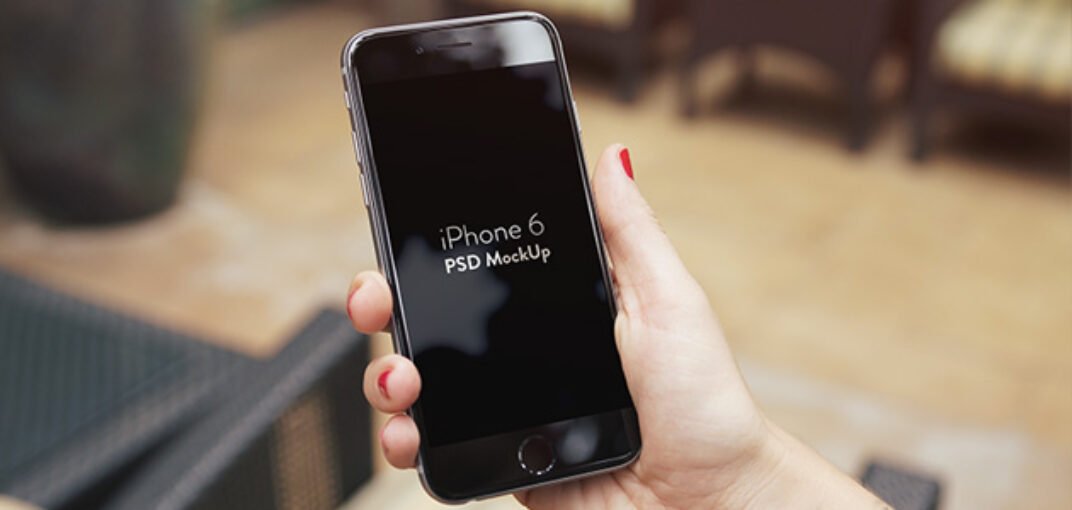 iPhone 6 Plus in female Hand Mockup