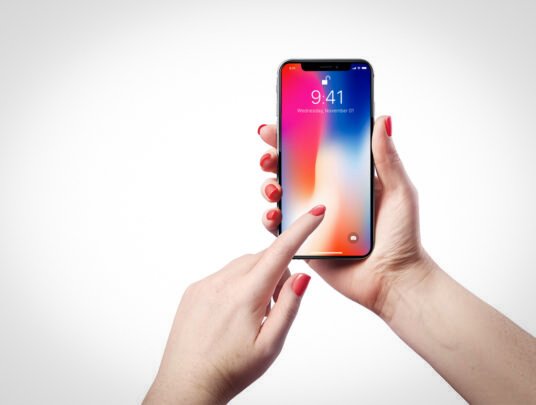 Female Holding iPhone X Free PSD Mockup